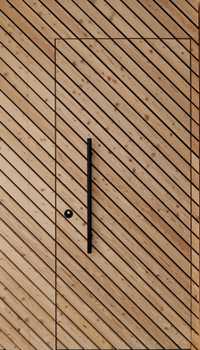 Concealed door with angled wooden slats